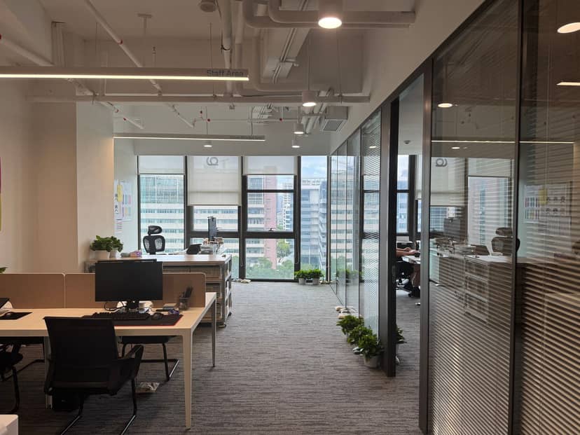 A modern startup office with founders at work